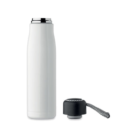 Botella de acero blanca con tapón al lado