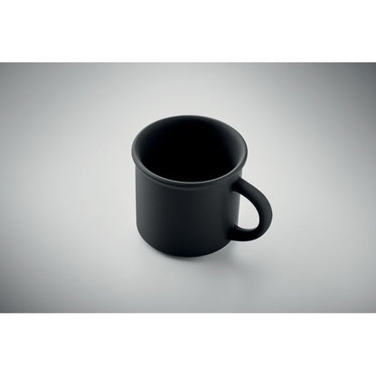 Vista superior de taza negra de cerámica