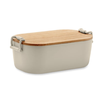 Fiambrera beige con tapa de bambú y cierres laterales.