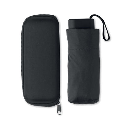 paraguas plegado en su funda y con el estuche de transporte al lado