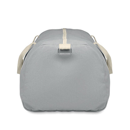 Lateral de bolsa de deporte en tejido reciclado de 320gr en color gris con asas de algodón natural y bandolera