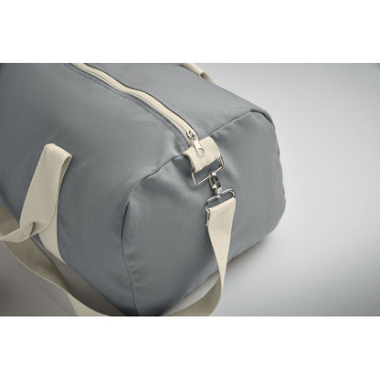 Detalle cremallera de Bolsa de deporte en tejido reciclado de 320gr en color gris con asas de algodón natural y bandolera