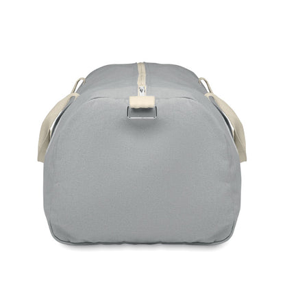 Lateral de bolsa de deporte en tejido reciclado en color gris con asas de algodón natural y bandolera