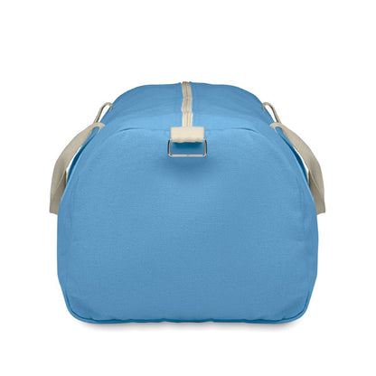 Lateral de bolsa de deporte en tejido reciclado azul con asas de algodón natural y bandolera