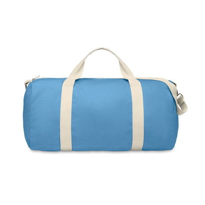 Lateral de bolsa de deporte en tejido reciclado azul con asas de algodón natural y bandolera