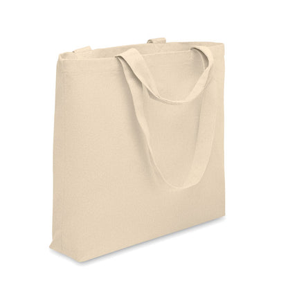 Bolsa de playa de lona beige con asas cortas y asas largas con fuelle