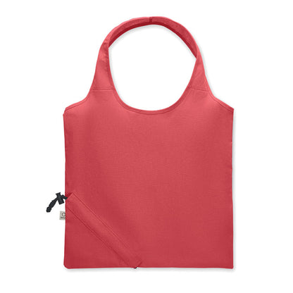 Parte frontal de bolsa de algodón  roja con sistema de plegado con mosquetón en la esquina inferior
