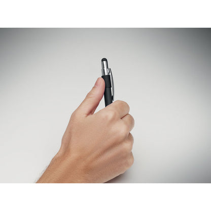 Mano utlizando el spinner antiestres de boli negro