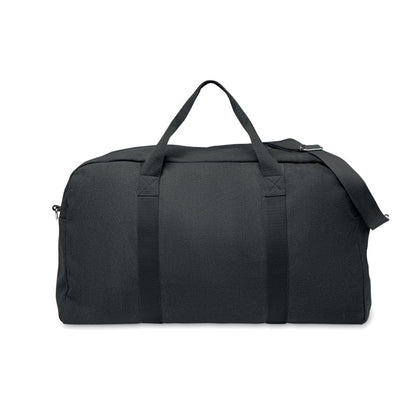 Bolsa de viaje elaborada en tejido reciclado de 450 g/m², con un 60% de algodón reciclado y 40% poliéster reciclado. Cuenta con correa de algodón ajustable y desmontable para un transporte cómodo. Su volumen de 3,64 litros y peso bruto de 0,52 kg la hacen una opción práctica y sostenible. Ideal para promociones corporativas que buscan unir funcionalidad y compromiso ambiental, destacando tu marca con un regalo duradero y responsable.