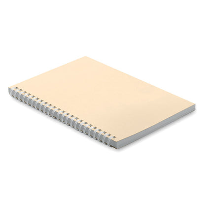 Cuaderno con tapas de cartón color crema y espiral de plástico