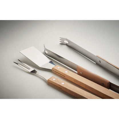 Pinzas, espatula y tenedor de barbacoa con mangos de madera