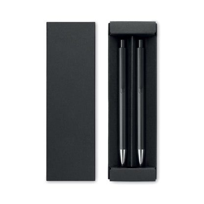 Caja abierta negra con 2 boli metálicos