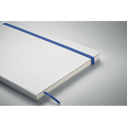parte trasera de libreta blanca con cierre goma azul
