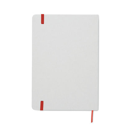 parte trasera de libreta blanca con cierre goma roja