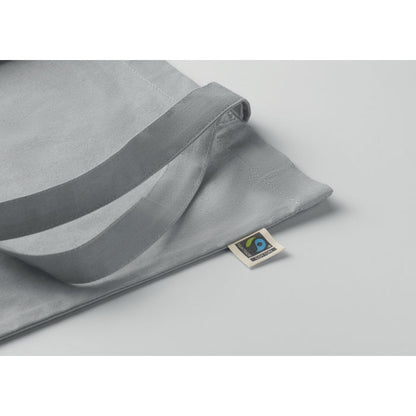 Detalle de asas en bolsa de algodón gris