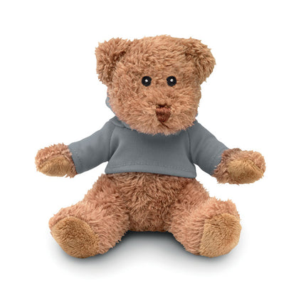 Osito de peluche marrón con camiseta gris vista frontal