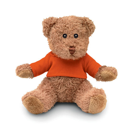 Osito de peluche marrón con camiseta naranja vista frontal