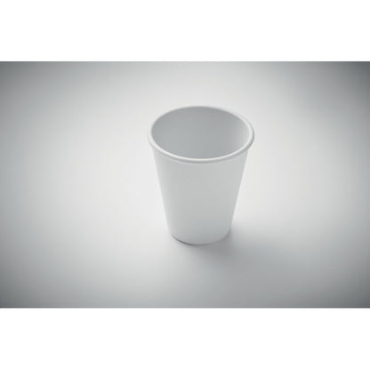 Vista superior de vaso blanco de plástico eco sobre fondo gris