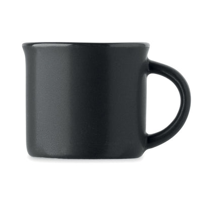Vista lateral de taza azul de café espresso