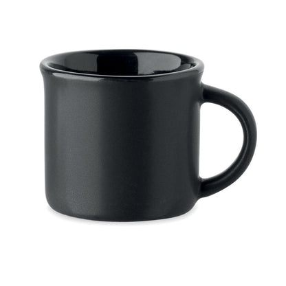 Vista frontal de taza de espresso. Negra. Cerámica