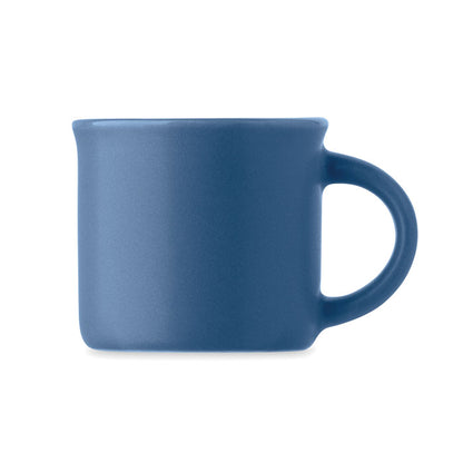 Vista lateral de taza azul de café espresso