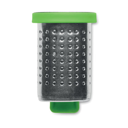 Vista superior de infusor de té con hojas de té