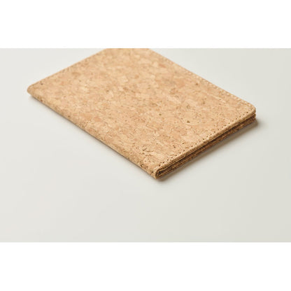 Vista lateral de funda para pasaportes de cocho natural