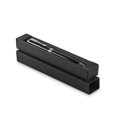 Vista lateral de boligrafo negro en caja con tapa abajo