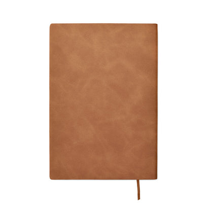 Contraportada de libreta marrón con marcapáginas de tela