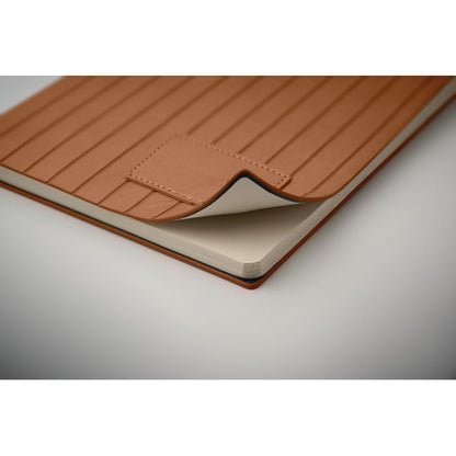 Cubierta marrón flexible de una libreta marrón