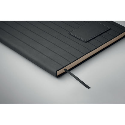 Detalle de lomo y marcapáginas de cuaderno de PU marrón