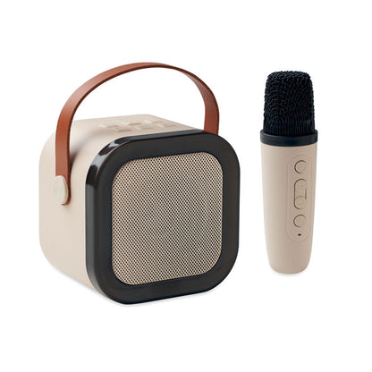 Altavoz con karaoke y micrófono