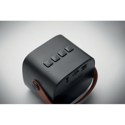 Vista superior de altavoz negro con botones de funcionamento