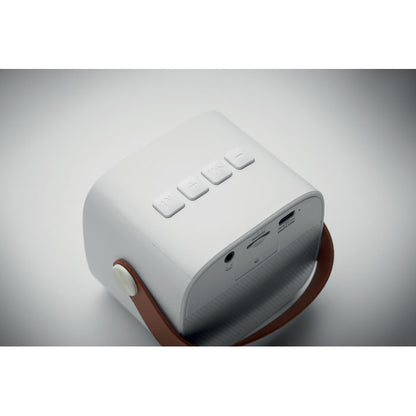 Vista superior de altavoz blanco con botones de funcionamento