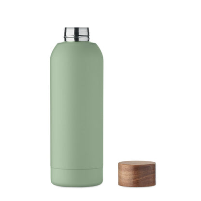 Vista frontal de botella verde pastel de acero ecológico con tapón de madera aun lado