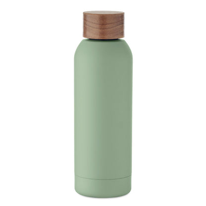 Vista frontal de botella verde pastel de acero ecológico con tapón de madera