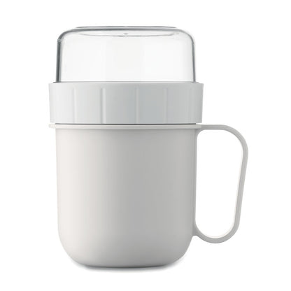 Vista superior de taza blanca con tapa y contenedor de alimentos