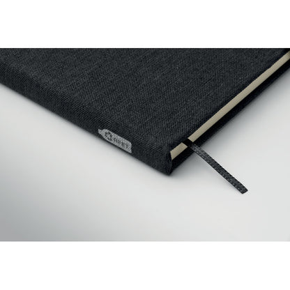 Detalle de esquina de libreta con etiqueta eco RPET