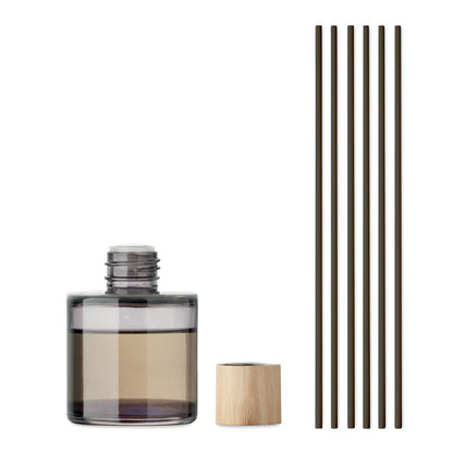 Vista frontal de difusor de aroma con tapón de madera y 6 varillas negras