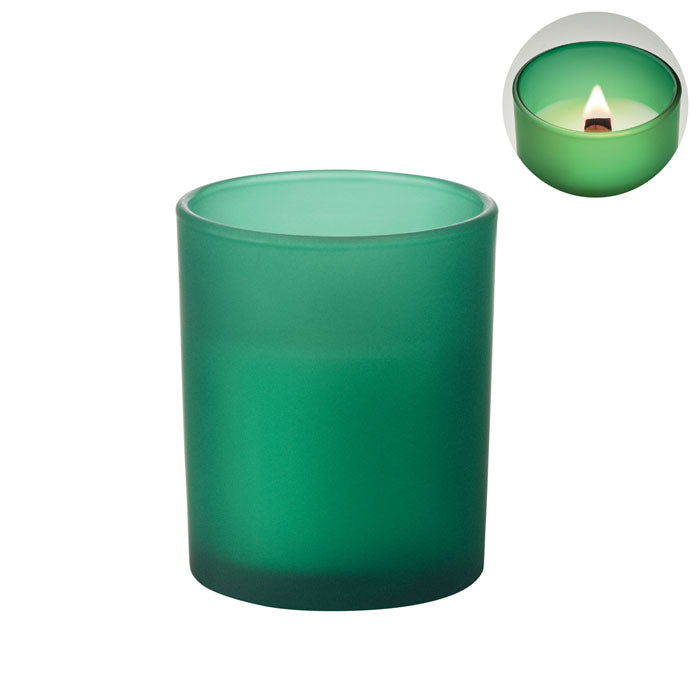 Vela de cera vegetal de 80 gr en frasco verde opaco, con luz encendida y mecha de madera visible.