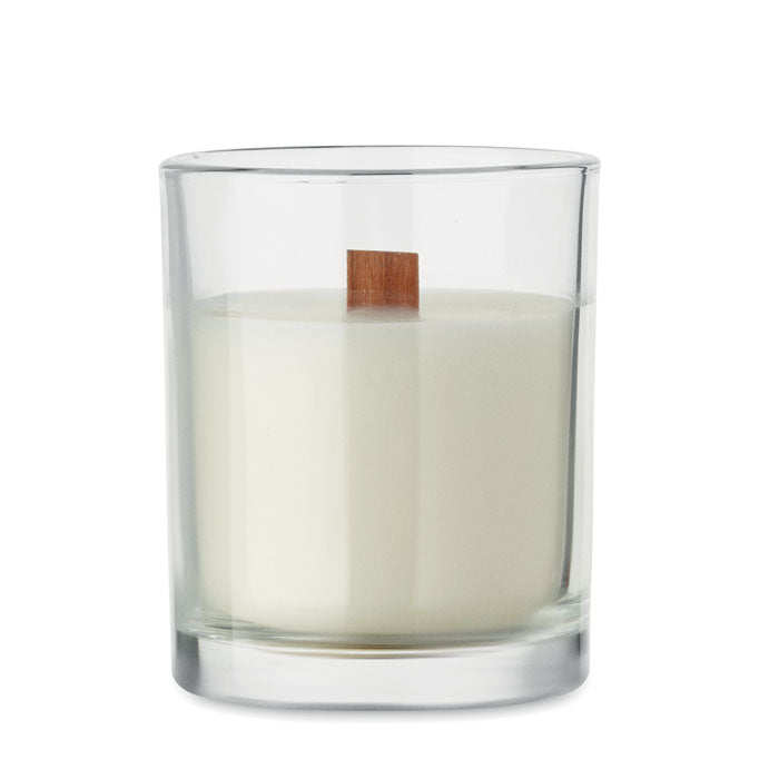 Vista frontal de vela de cera vegetal en vaso de vidrio transparente, con mecha de madera. KIVAS WOOD - Vela de cera vegetal 80 gr.
