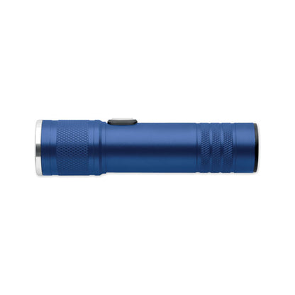 Linterna azul de luz COB encendida sobre una superficie gris