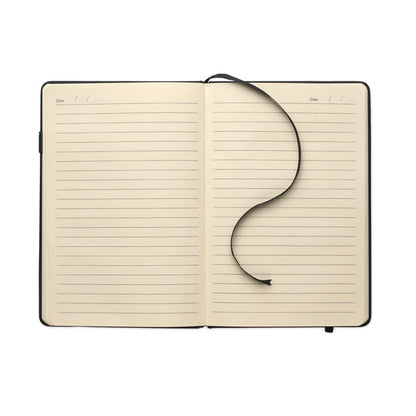 Libreta abierta mostrando hojas color crema rayadas con marcapáginas