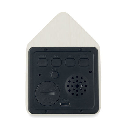 Vista posterior de reloj cuco con forma de casa