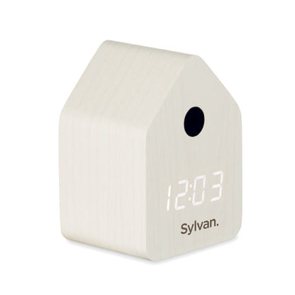 Visa lateral de reloj cuco blanco digital