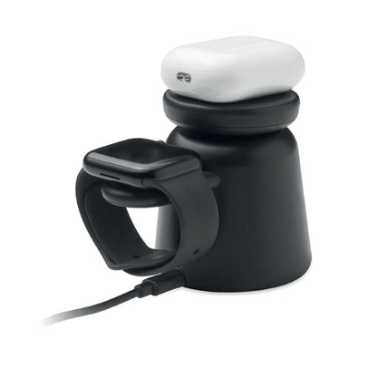 Teléfono y reloj en base de carga negra