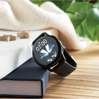 mesa con reloj Smartwhatch inalámbrico negro con multifunción pantalla encendida