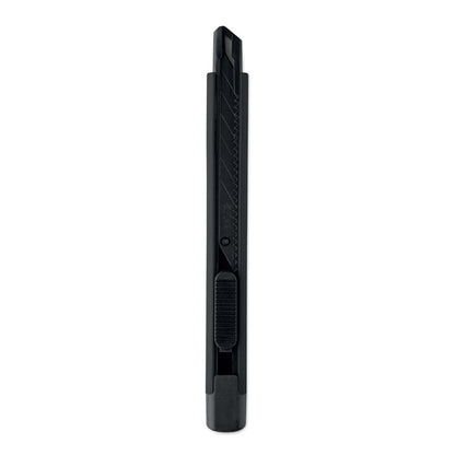 Cúter compacto negro con hoja retraída
