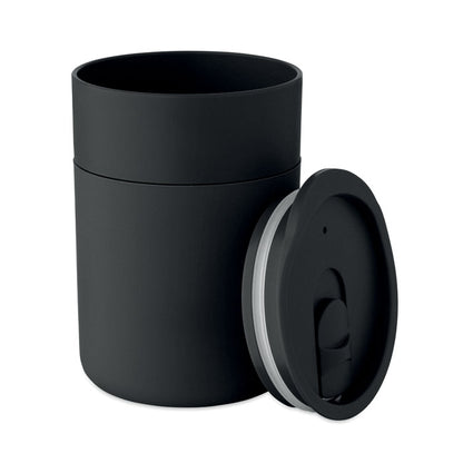 Vaso negro con tapa retirada apoyada al lado