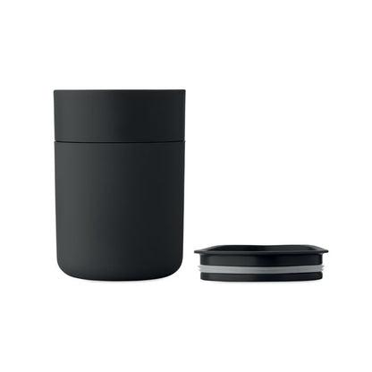 Vaso negro desmontado mostrando tapa y cuerpo